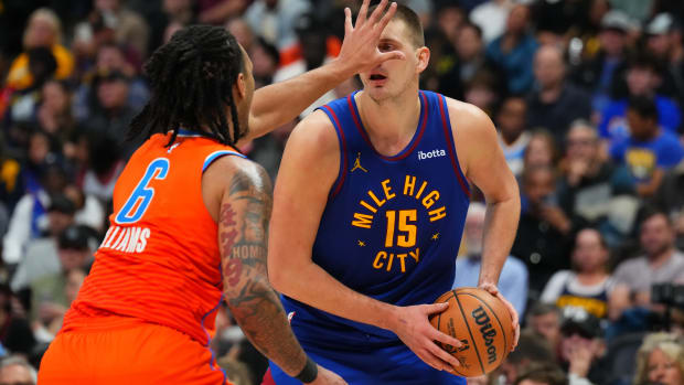 Dec 16, 2023; Denver, Colorado, USA; Oklahoma City Thunder forward Jaylin Williams (6) shields Denver Nuggets center Nikola Jokic (15) in the second half at Ball Arena.